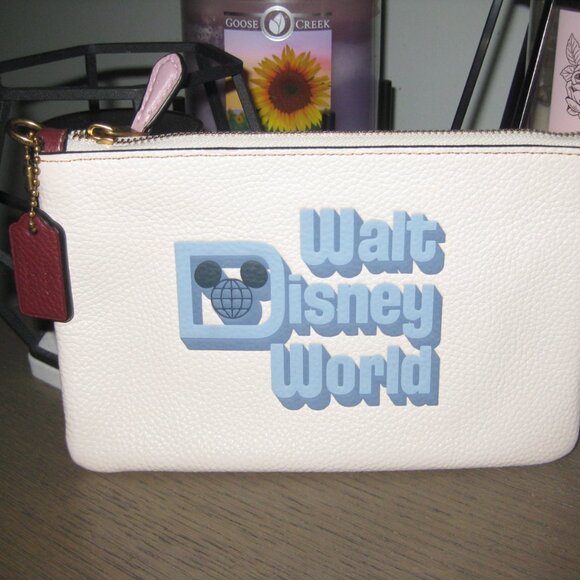 NWT Coach Walt Disney World small wristlet in Chalk - New but missing loop strap - Picture 1 of 2